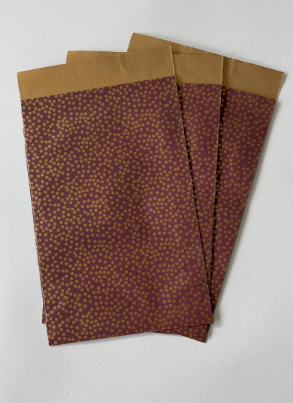 Cadeauzak gouden stippen